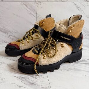 Stylish Tan and Black Boots with Gold Accents